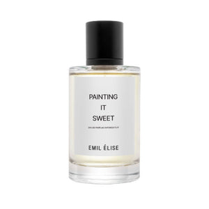 Emil Élise - painting it sweet Parfumflakon mit klarer Flüssigkeit und schlichter weißer Etikettgestaltung vor weißem Hintergrund