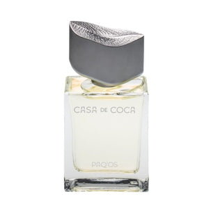 Casa de Coca - Paq'os Parfumflakon mit rechteckigem Glas und silberner, blattförmiger Kappe vor weißem Hintergrund