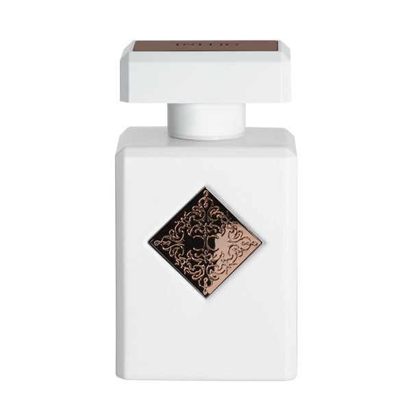 Initio - Hedonist Collection - Paragon Parfumflakon in weiß mit quadratischem Verschluss und filigranem Ornament auf der Frontseite