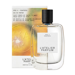 L'Atelier Parfum - Opus 4 - Peartopia Flakon mit klarem Glas und schwarzem Deckel vor goldenem Hintergrund
