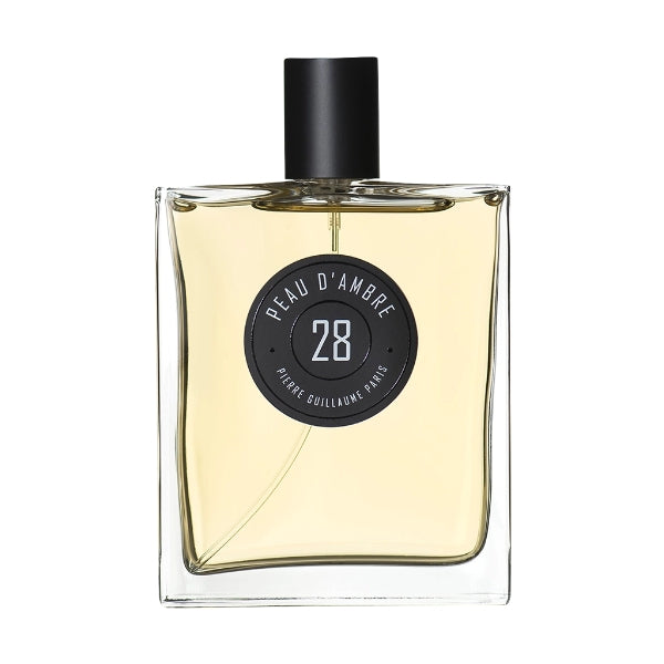 Pierre Guillaume - Peau d'Ambre No.28 Parfumflakon mit klarem Glas und schwarzem runden Label vor weißem Hintergrund