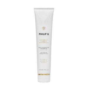 Philip B - Peppermint Avocado Conditioner im schlanken weißen Tubendesign mit goldenen Akzenten vor weißem Hintergrund