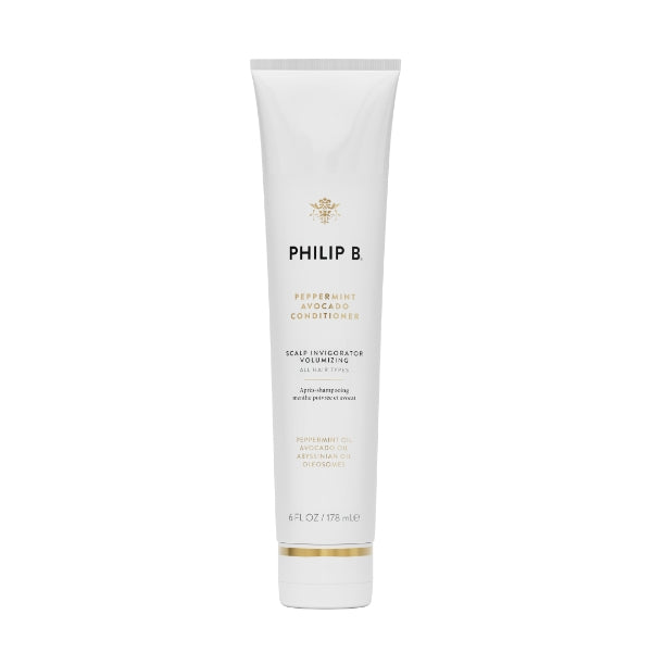 Philip B - Peppermint Avocado Conditioner im schlanken weißen Tubendesign mit goldenen Akzenten vor weißem Hintergrund