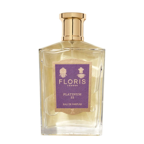 Floris - Platinum 22 Parfumflakon mit goldfarbenem Verschluss und violett-goldenem Etikett vor weißem Hintergrund