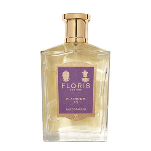 Floris - Platinum 22 Parfumflakon mit goldfarbenem Verschluss und violett-goldenem Etikett vor weißem Hintergrund
