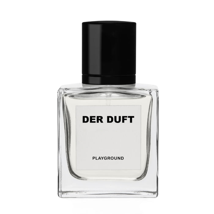 DER DUFT - Playground Parfumflakon mit klarer, minimalistischer Form und schwarzem Verschluss vor weißem Hintergrund