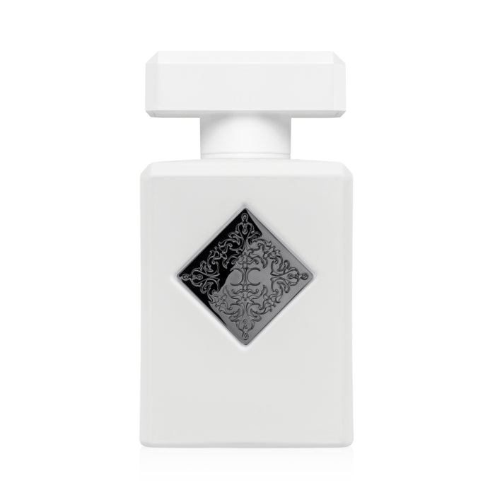 Initio - Hedonist Collection - Power Self Parfumflakon in weiß mit schwarzem Ornament vor hellem Hintergrund