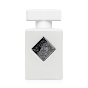 Initio - Hedonist Collection - Power Self Parfumflakon in weiß mit schwarzem Ornament vor hellem Hintergrund