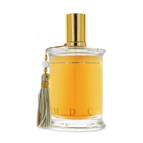 Parfums MDCI Paris - Promesse de l'Aube Parfumflakon mit goldenem Verschluss und stilvollem Quastenanhänger vor weißem Hintergrund