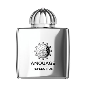 Amouage - Reflection Woman Parfum in silbernem Flakon mit gewölbtem Deckel vor weißem Hintergrund