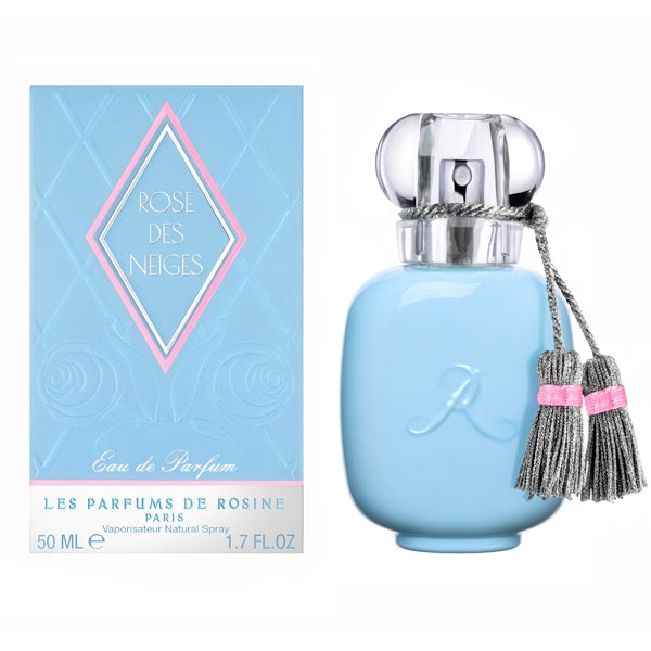 Parfums de Rosine - Rose des Neiges Parfumflakon in pastellblau mit silberner Quaste vor weißem Hintergrund