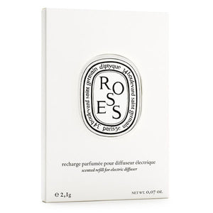 Diptyque - Roses / Rose - Capsule in schlichter weißer Verpackung mit klassischem schwarz-weißem Emblem und klarer Typografie