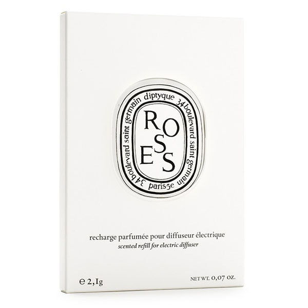 Diptyque - Roses / Rose - Capsule in schlichter weißer Verpackung mit klassischem schwarz-weißem Emblem und klarer Typografie