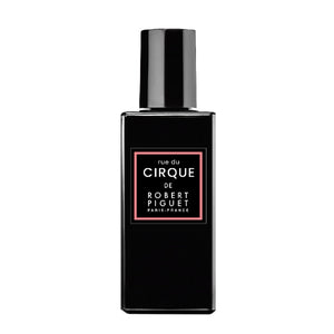 Piguet - rue du Cirque Parfumflakon im schlichten schwarzen Design mit zartem rosafarbenem Rahmen und elegantem Schriftzug