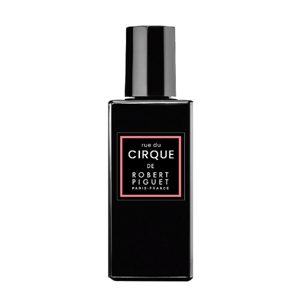 Piguet - rue du Cirque Parfumflakon im schlichten schwarzen Design mit zartem rosafarbenem Rahmen und elegantem Schriftzug