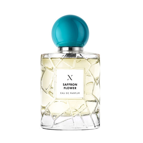 Les Sœurs de Noé - Saffron Flower Parfumflakon mit kristallklarem Glas und türkisfarbener runder Kappe vor weißem Hintergrund