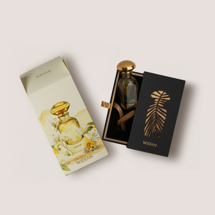 Widian - Gold Collection - Samar Parfumflakon mit goldenem Verschluss und kunstvoller Verpackung vor hellem Hintergrund