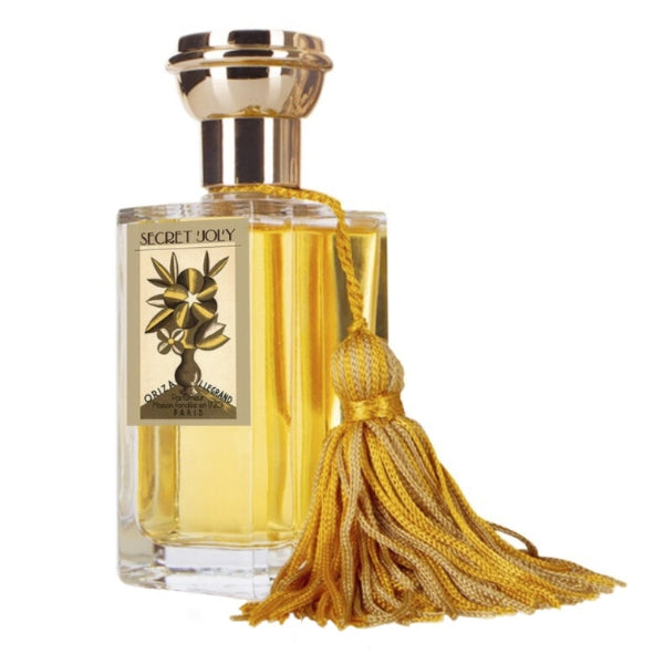 Oriza L. Legrand - Secret Joly Duftflakon mit goldfarbenem Verschluss und dekorativem Quastenanhänger in klarem Glas