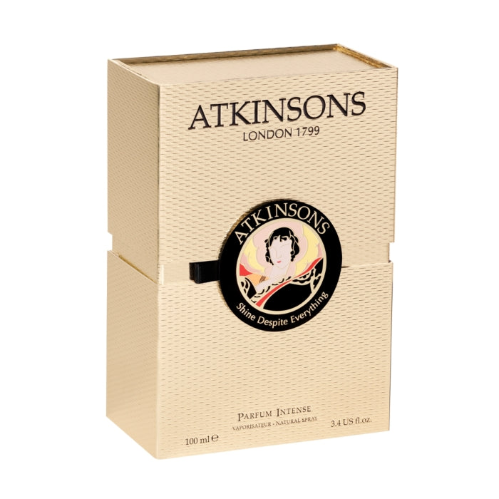 Atkinsons 1799 - Shine Despite Everything elegante goldene Parfümverpackung mit klassischem Emblem und dezenter Struktur