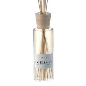 Linari - Siena - Diffusor klare Flasche mit Holzdeckel und Duftstäbchen vor weißem Hintergrund