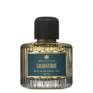 Aedes de Venustas - Signature Eau de Parfum mit geriffeltem Glasflakon und dunkelblauem Etikett vor weißem Hintergrund