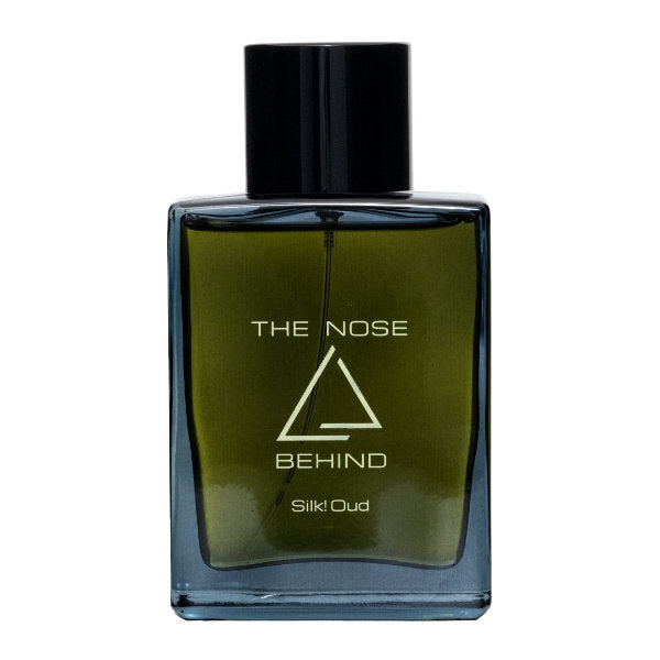 The Nose Behind - Silk! Oud zeigt rechteckigen Flakon mit dunkelgrünem Glas und schlichtem schwarzem Verschluss
