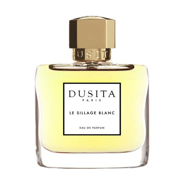 Dusita - Le Sillage Blanc Parfumflakon mit klarem Glas, goldfarbenem Verschluss und hellem Duft vor weißem Hintergrund