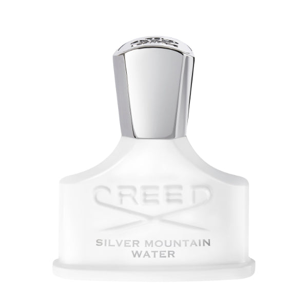 Creed - Silver Mountain Water Flakon in elegantem mattem Weiß mit silberfarbenem Verschluss vor weißem Hintergrund