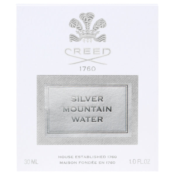 Creed - Silver Mountain Water edle Verpackung in Weiß mit silberfarbener Prägung auf klarem, schlichtem Hintergrund