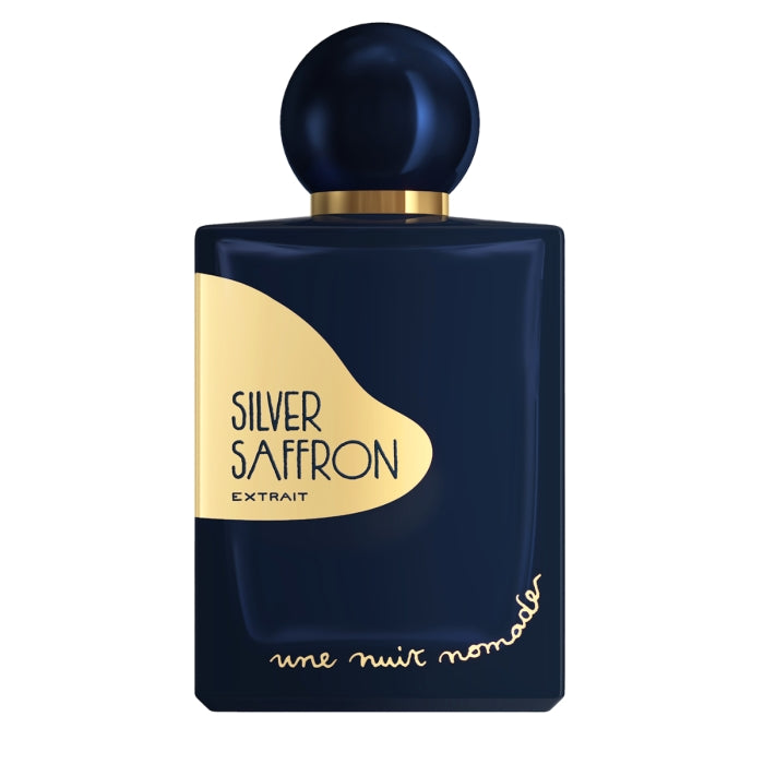 Une Nuit Nomade - Extraits de Voyage - Silver Saffron Parfumflakon in Dunkelblau mit goldener Etikette und rundem Verschluss