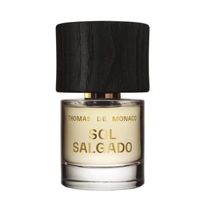 Thomas de Monaco - Sol Salgado klarer Flakon mit warmem Gelbton und mattem schwarzen Holzdeckel elegant schlicht