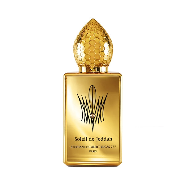 Stéphane Humbert Lucas 777 - Soleil de Jeddah zeigt goldenen Flakon mit wabenförmigem Deckel und edlem Design vor weißem Hintergrund