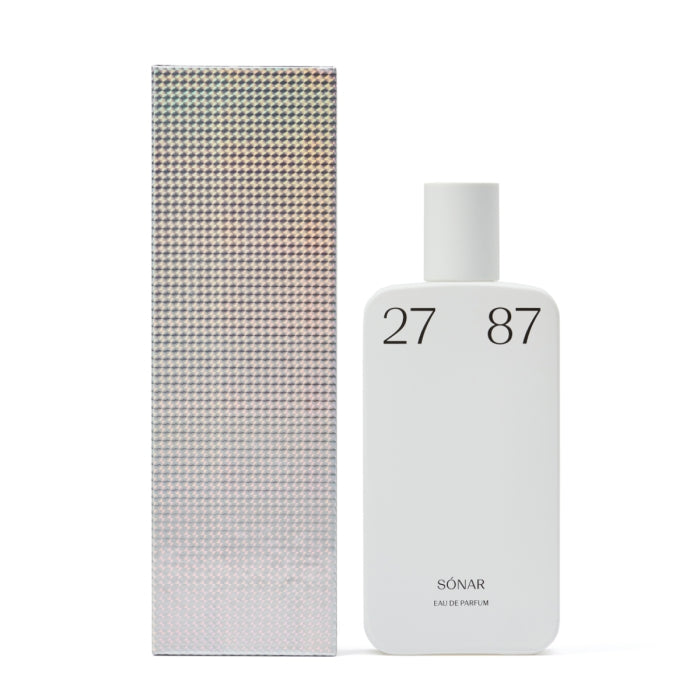 27 87 Perfumes - Wild Line - sónar Parfumflakon in schlichtem weißen Design mit reflektierender Verpackung vor weißem Hintergrund