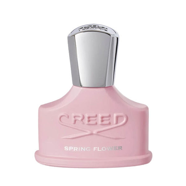 Creed - Spring Flower rosafarbener Flakon mit silbernem Deckel und eingeprägtem Logo auf weißem Hintergrund