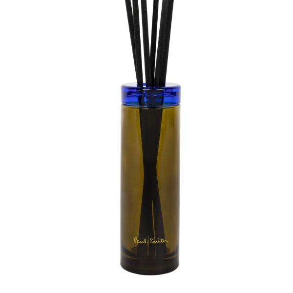 Paul Smith - Storyteller - Diffusor mit olivgrün-blauem Glasflakon und schwarzen Duftstäbchen für gemütliche Raumdüfte