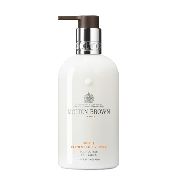 Molton Brown - Sunlit Clementine & Vetiver Body Lotion in eleganter weißer Flasche mit Pumpspender für reichhaltige Pflege