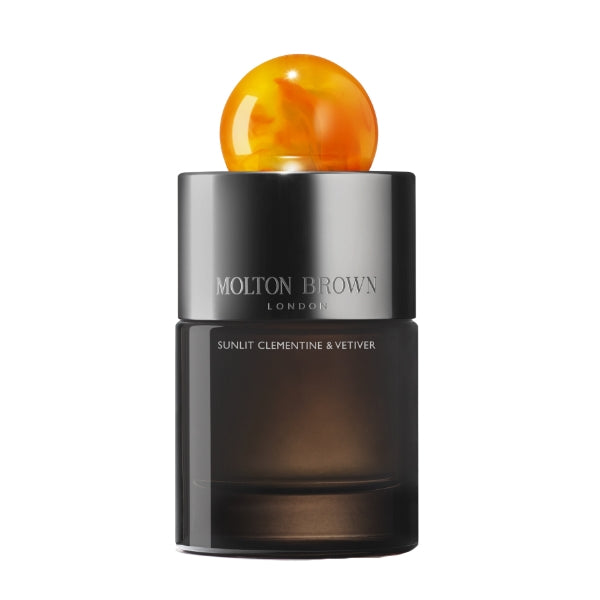 Molton Brown - Sunlit Clementine & Vetiver Eau de Parfum mit elegantem dunklem Flakon und orangefarbener Kugel als Verschluss