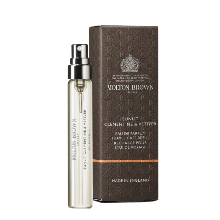 Molton Brown - Sunlit Clementine & Vetiver - Eau de Parfum Reisezerstäuber mit dunkler Verpackung und klarer Flasche