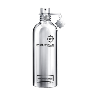Montale Sweet Oriental Dream Eau de Parfum in polished silver spray bottle with distinctive charm on white background