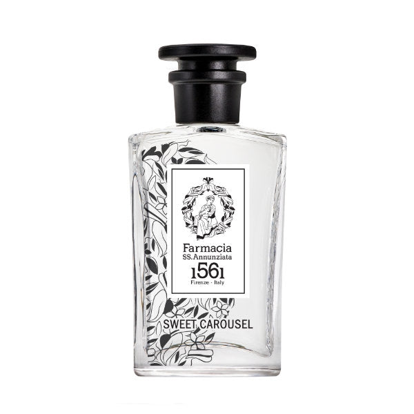 Farmacia SS. Annunziata - Sweet Carousel Parfumflakon mit floralem Schwarz-Weiß-Motiv auf klarem Glas vor weißem Hintergrund