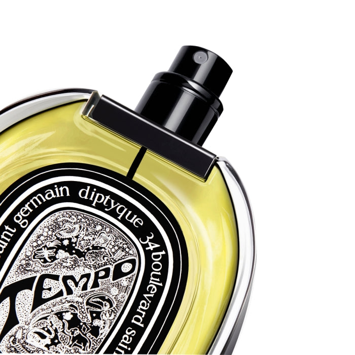 Diptyque - Tempo edler Parfumspray mit schwarzem Sprühkopf und floraler Illustration auf transparentem Flakon