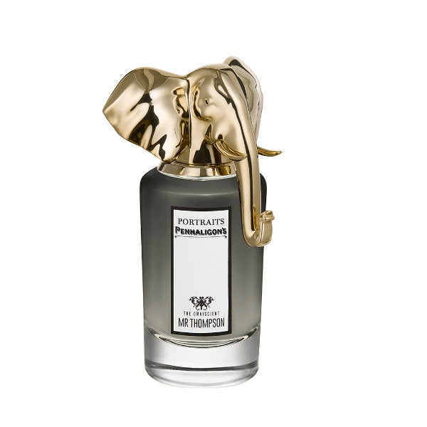Penhaligon's - Portraits - The Omniscient Mr. Thompson zeigt Flakon mit goldenem Elefantenkopf und schwarzem Glasfuß