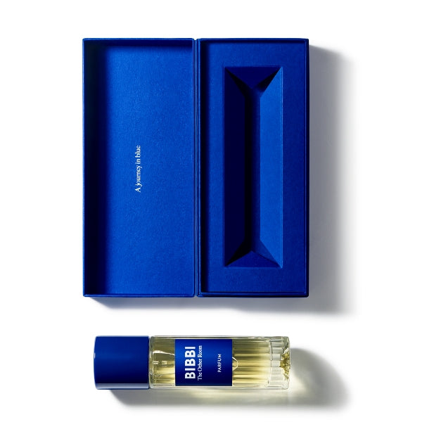 BIBBI Paris - The Other Room edle blaue Geschenkbox und flacher Glasflakon vor weißem Hintergrund