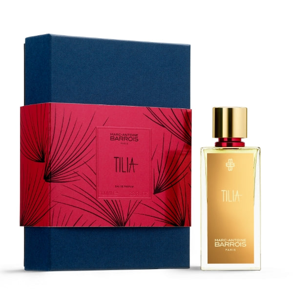 Marc-Antoine Barrois - Tilia Parfümflakon mit goldfarbenem Etikett und Geschenkbox in Blau und Rot vor weißem Hintergrund