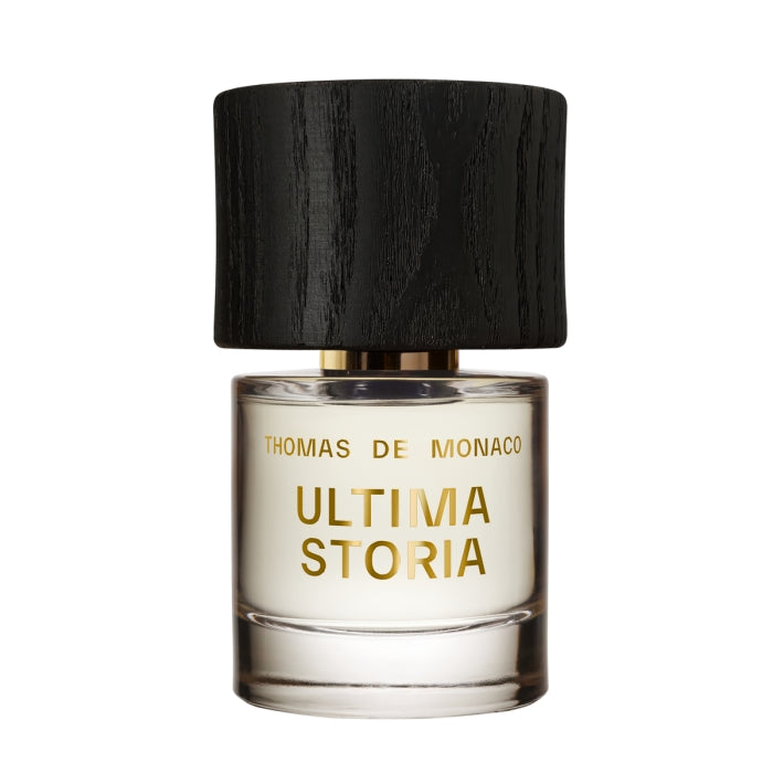 Thomas de Monaco - Ultima Storia Parfumflakon mit goldener Schrift und schwarzem Holzdeckel auf weißem Hintergrund