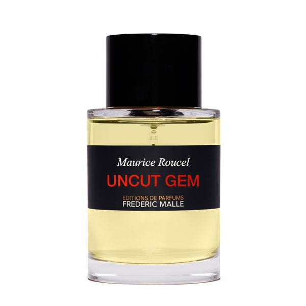 Frédéric Malle - Uncut Gem Parfumflakon mit klarem Glas, schwarzem Verschluss und schlichtem Etikett mit rotem Schriftzug vor weißem Hintergrund