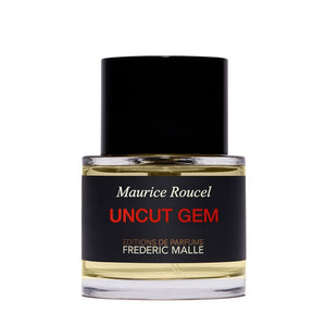 Frédéric Malle - Uncut Gem Parfumflakon mit transparentem Glas, schwarzem Verschluss und schwarzem Etikett vor weißem Hintergrund