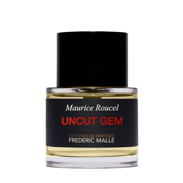 Frédéric Malle - Uncut Gem Parfumflakon mit transparentem Glas, schwarzem Verschluss und schwarzem Etikett vor weißem Hintergrund