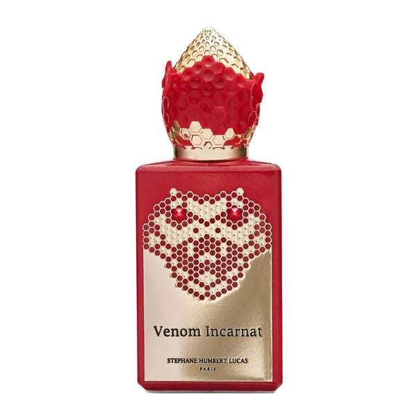 Stéphane Humbert Lucas 777 - Venom Incarnat Parfumflakon mit rotem Leder und goldener Wabenverzierung vor weißem Hintergrund