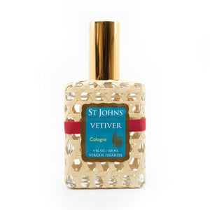 St Johns - Vetiver Kölnflakon mit goldenem Deckel und gewebtem Muster, blauem Etikett und rotem Bindeband vor weißem Hintergrund
